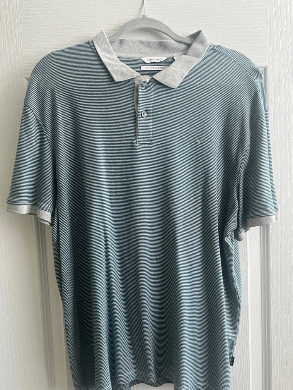 Calvin Klein Men's Light Blue and White Thin-Striped Polo